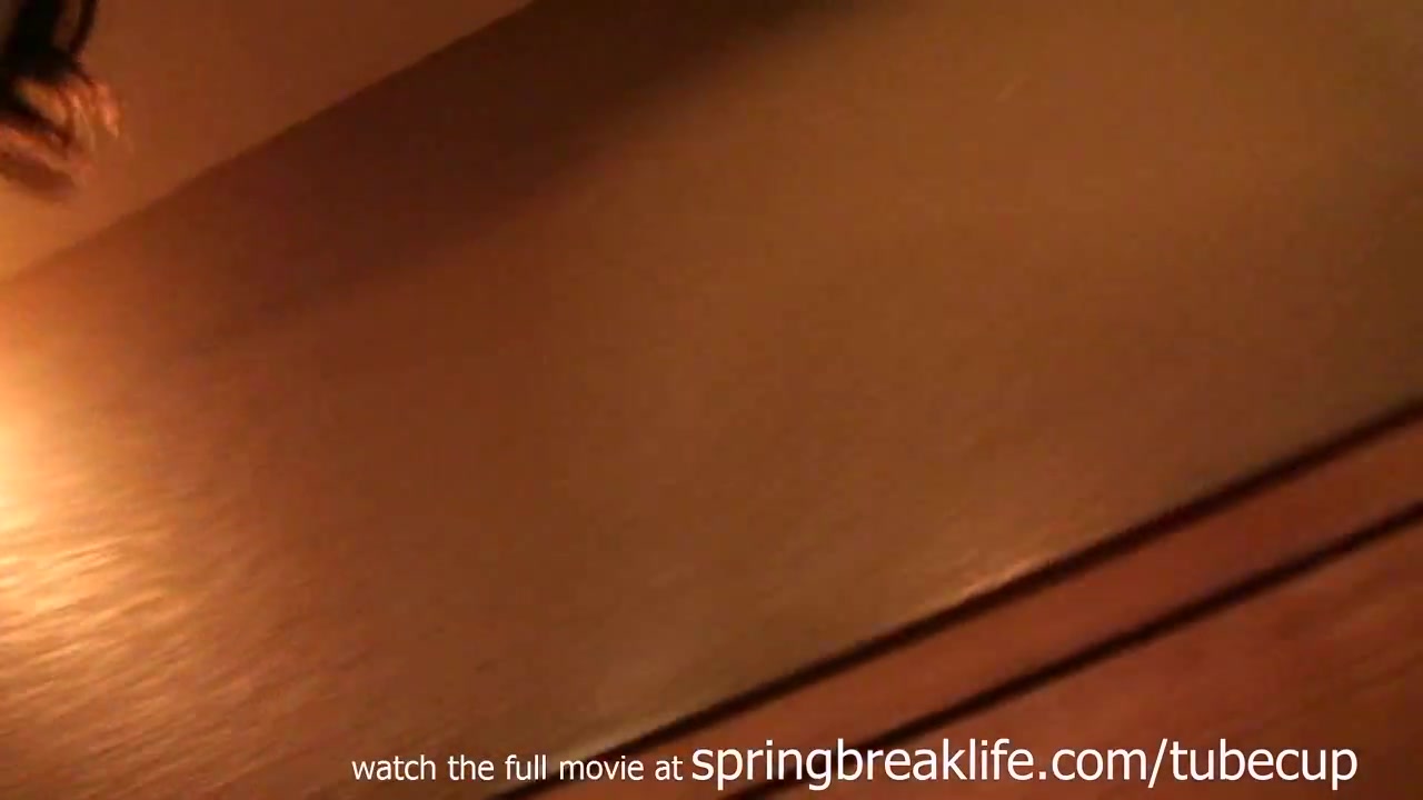 SpringBreakLife Video: Brunette Flashes In Bar Then Pees