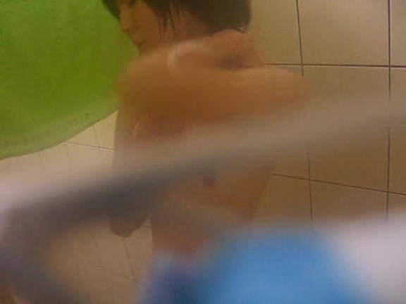 Young Asian babe caught naked in the bathroom by horny