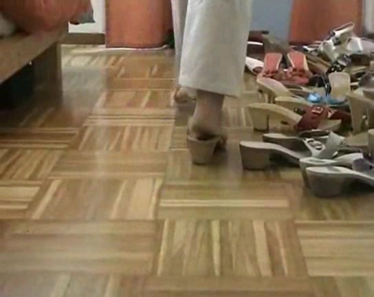 Lovely woman trys on different shoes in the foot fetish vid