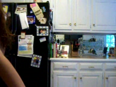 Young busty chick strips in the kitchen, where she belongs