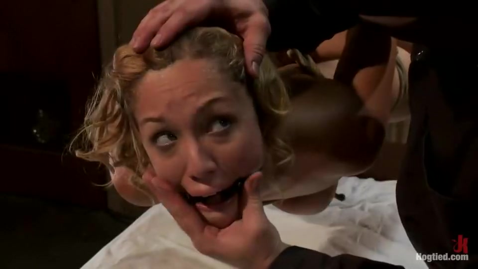 Helpless Blonde in hogtie struggling through orgasm after orgasm.