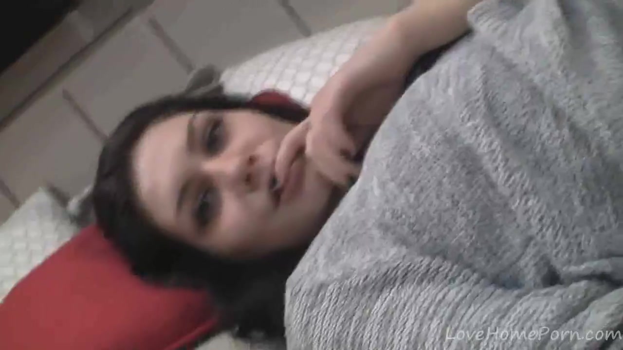 Girl in a gray shirt shows her tits