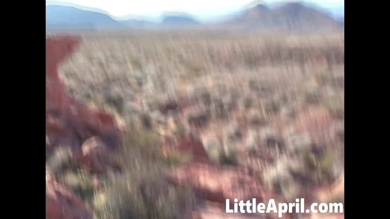 Little April fingering her pussy in the open while hiking