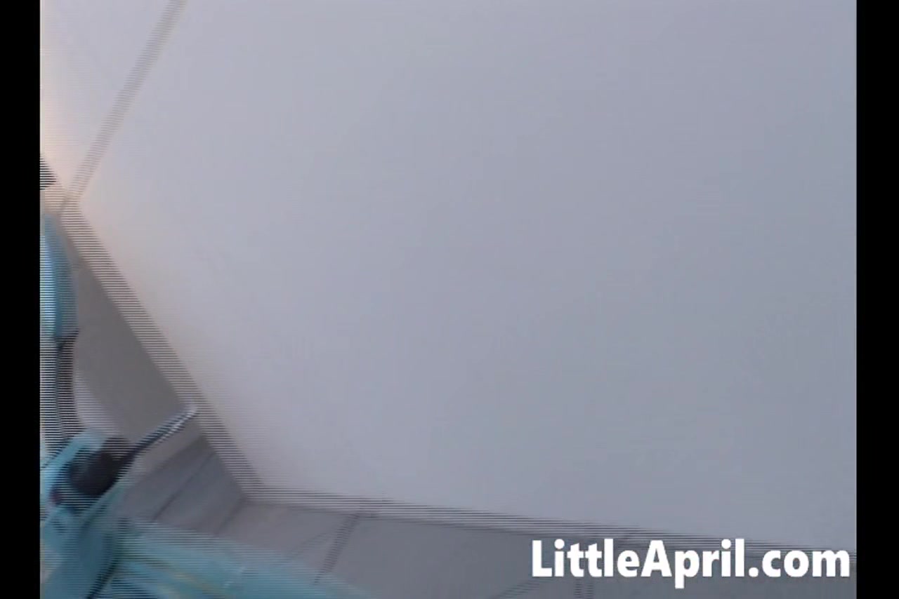 Little April masturbates in hot solo scene