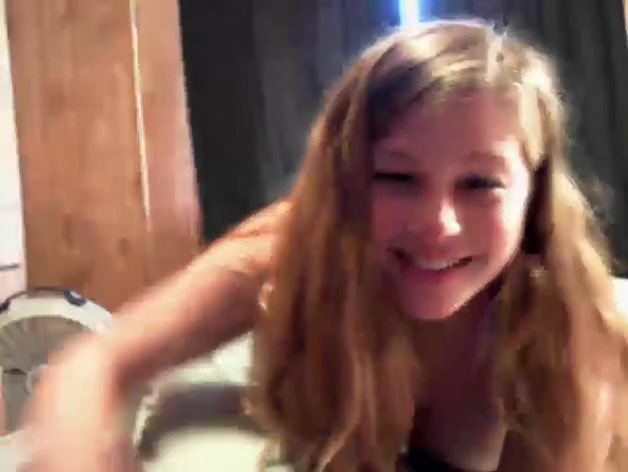Blonde chick with big tits spreading her pussy lips wide
