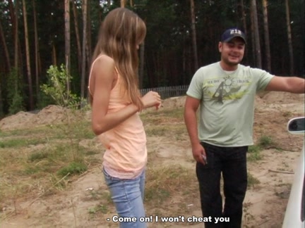 Youthful hotty showing breasts in the forest