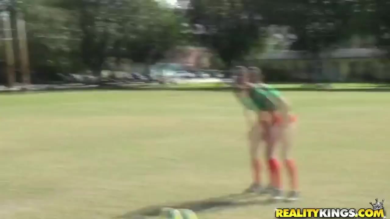 Molly Cavalli and Tiffany Tyler play football