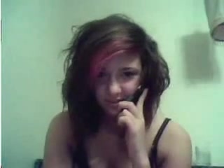 She has a dirty phone conversation while rubbing herself