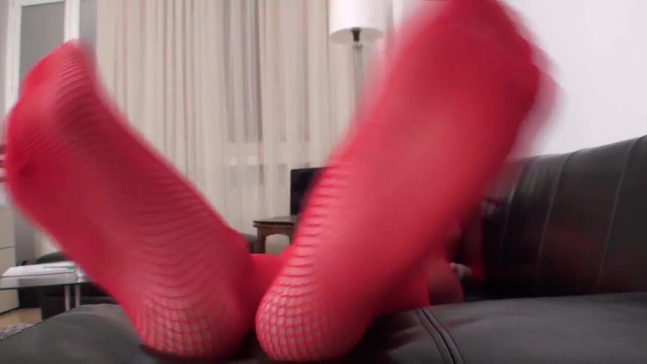 Sexy feet playing in red fishnet body-stockings by Foot Girls