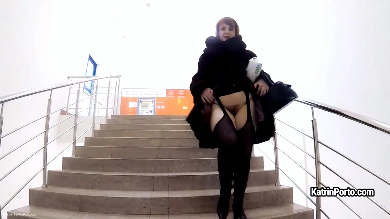 Sexy BBW Katrin Porto in fur coat shows her hairy cunt outdoor