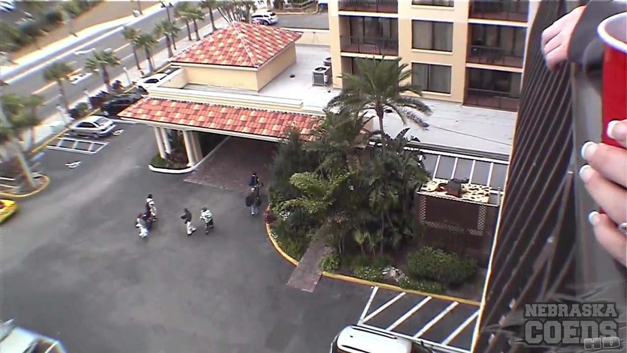 Super Hotties Playing Drinking Games on Balcony - NebraskaCoeds