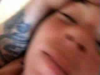 She sucks his cock until he drops a load right on her sexy face
