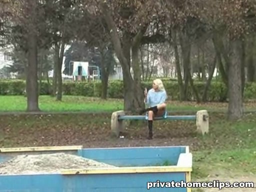 Shameless blonde wench reveals her fresh pussy in public