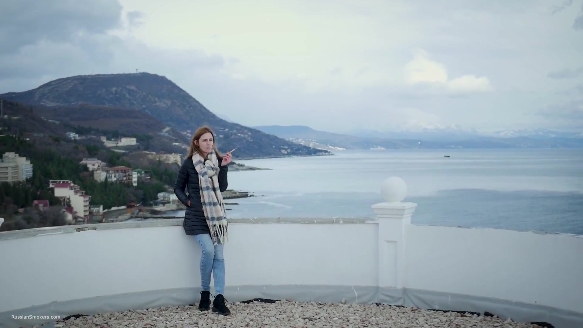 Beautiful Lady Is Smoking Two Saratoga Cigarettes In A Row On A Beautiful View