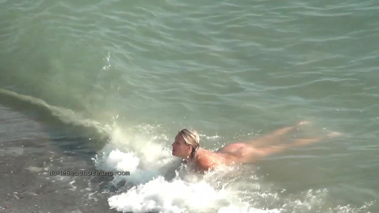 Nudist girls expose bodies at the beach