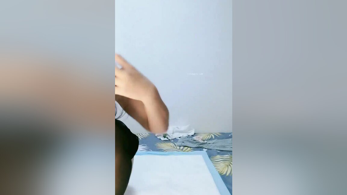 Asian MILF gets fucked by a white skunk on camera.