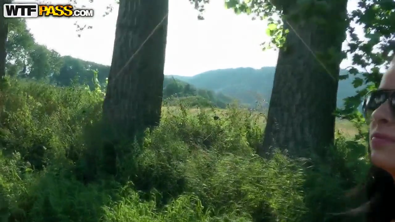 Leggy brunette seduced to masturbate in park