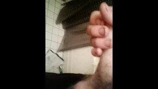 Masturbating