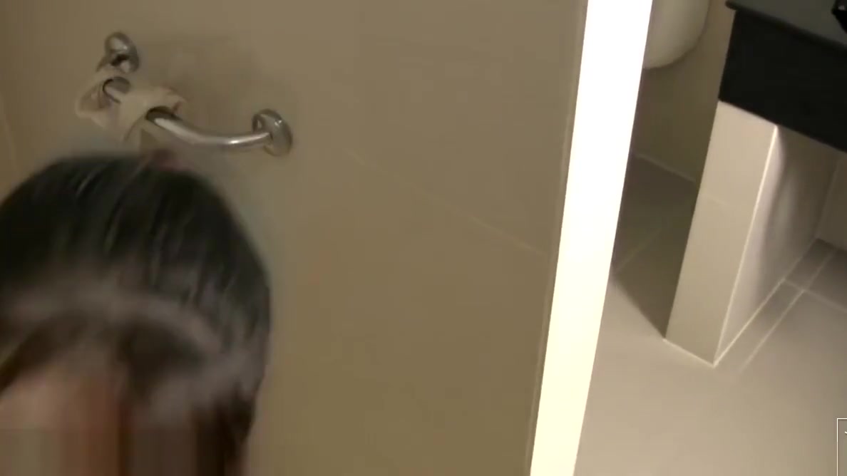 Pigtailed ladyboy strips and swallows cock in POV in shower
