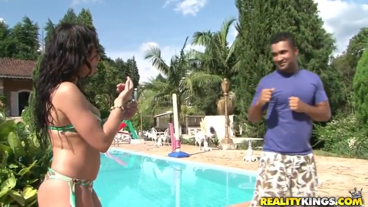 Roberta Carioca getting seduce by a handsome man outdoors on a pool
