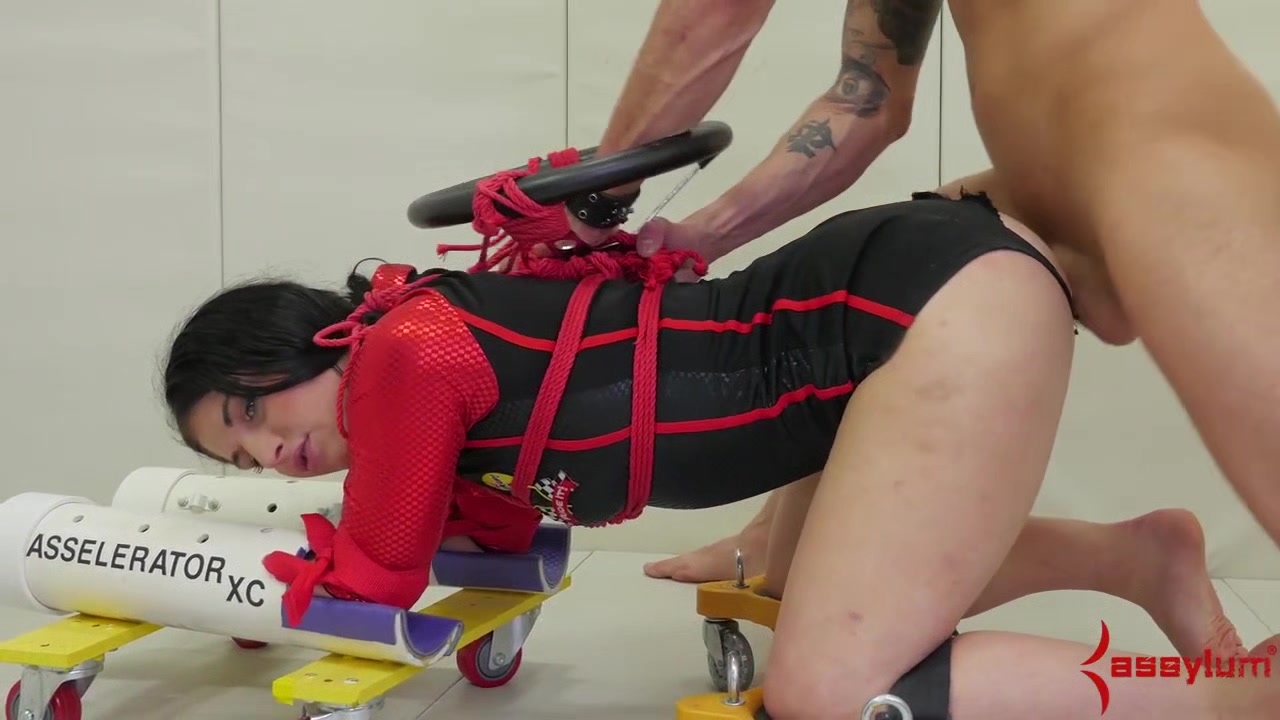 Formula one BDSM sub getting anally rammed