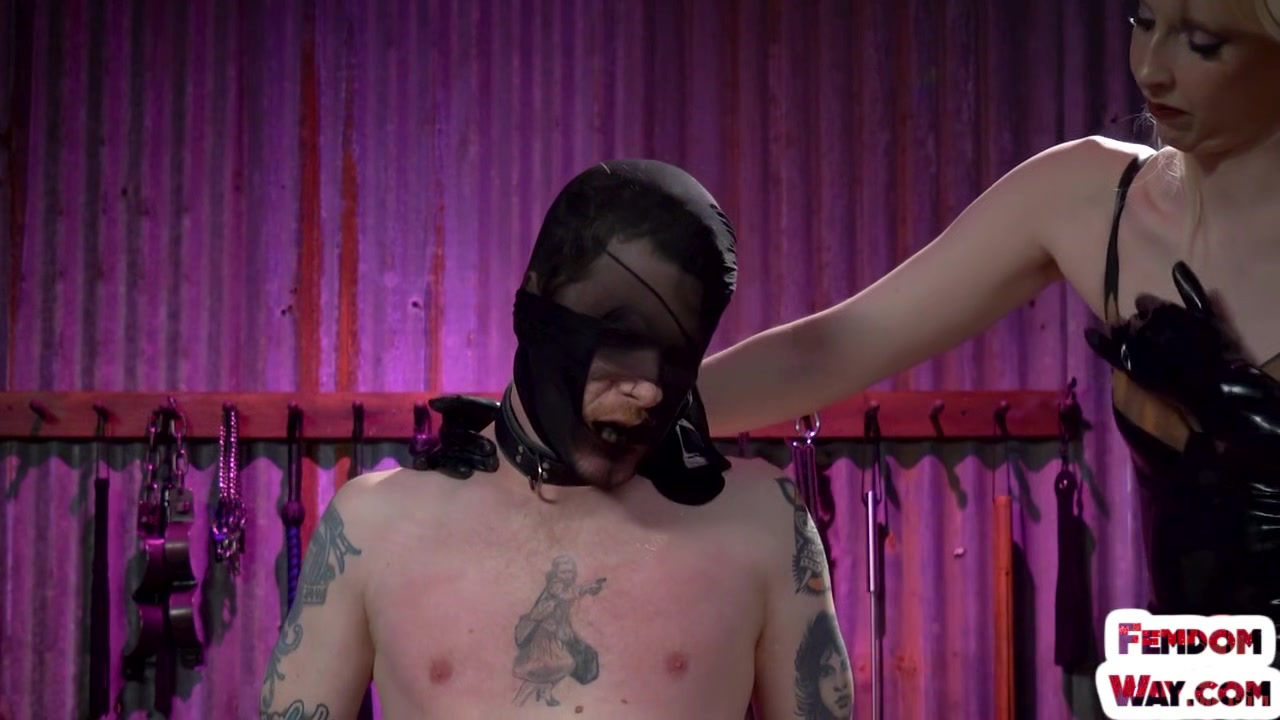 BDSM latex dominas spanks sub with her gloves hands