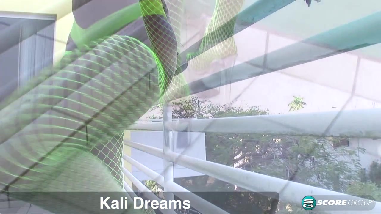 Green fishnets and fuck-me pumps