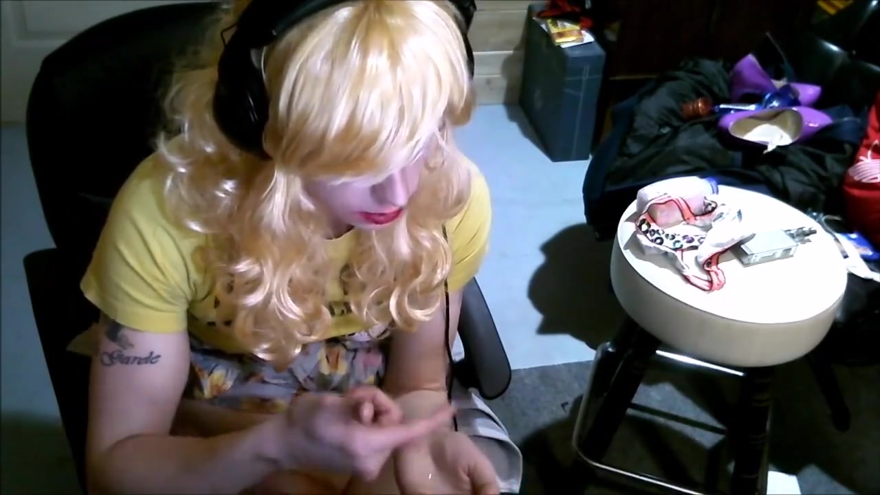 Young sissy covers her face in cum
