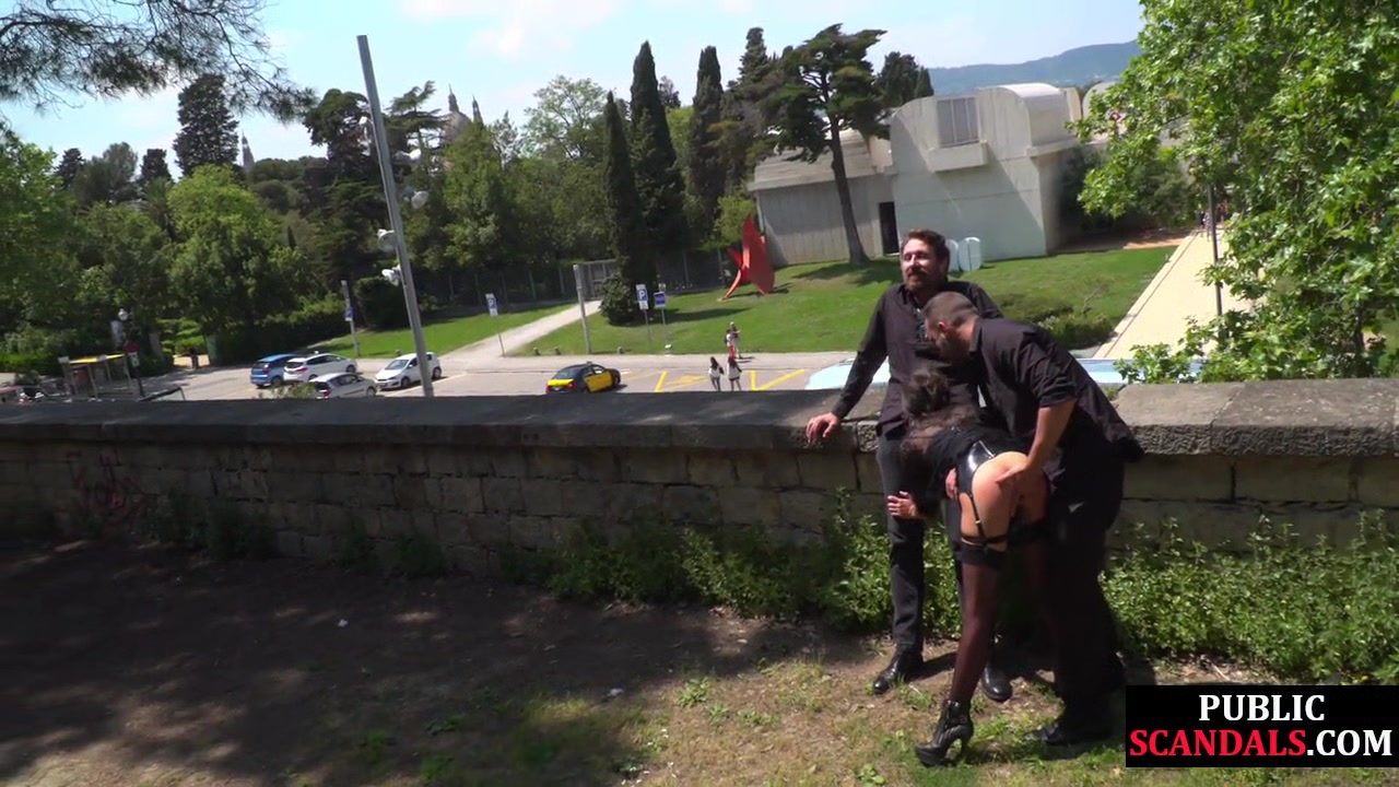 Public babe deepthroating outdoor while spanked in 3some