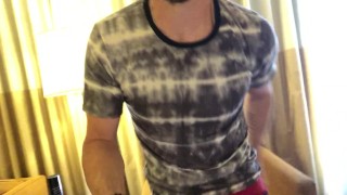 Pulling out bulging cock from jeans and stroking