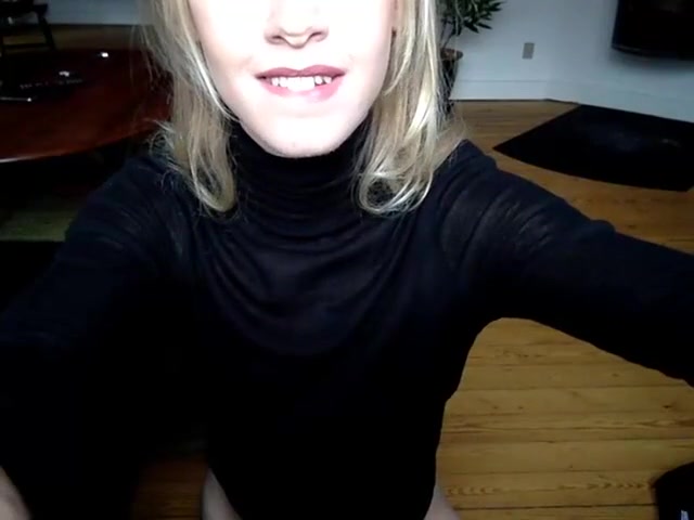 Kate May In A black suit On The Floor With A dildo