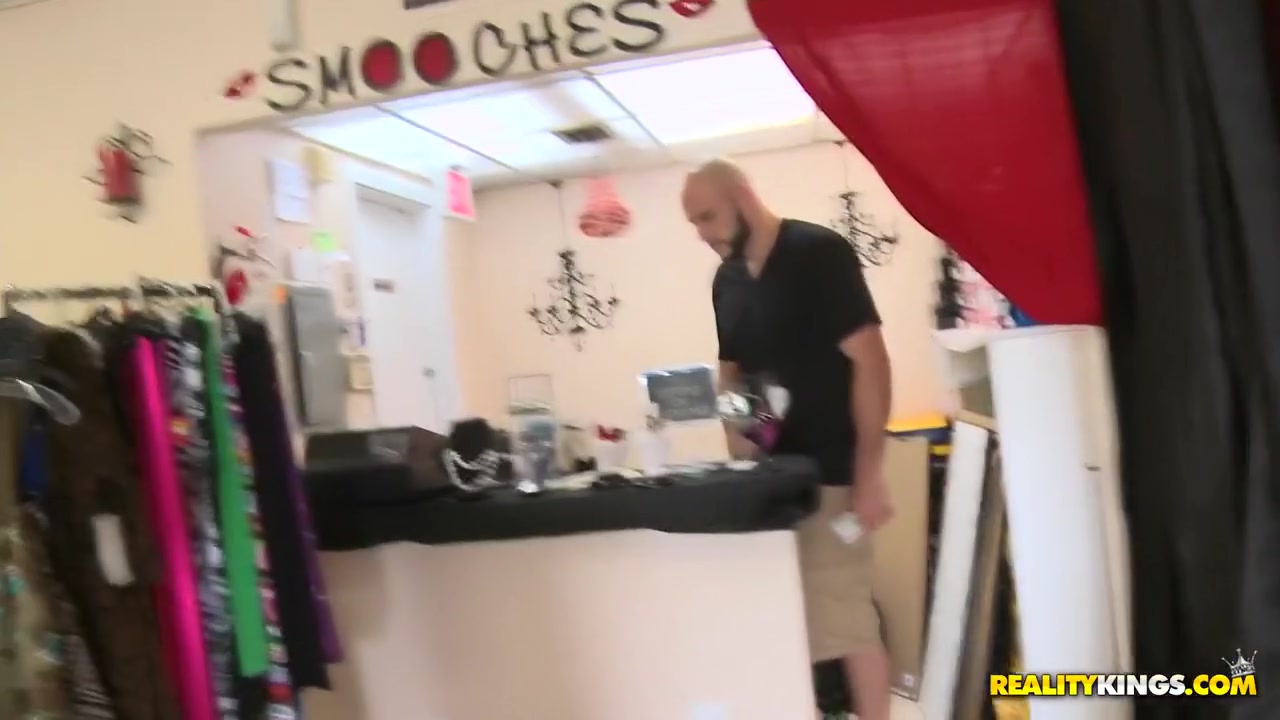 Jmac works his customers at the local clothing store