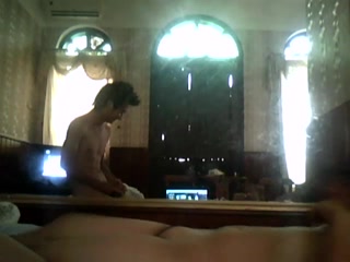 Amateur Asian couple recording their fun time on camera