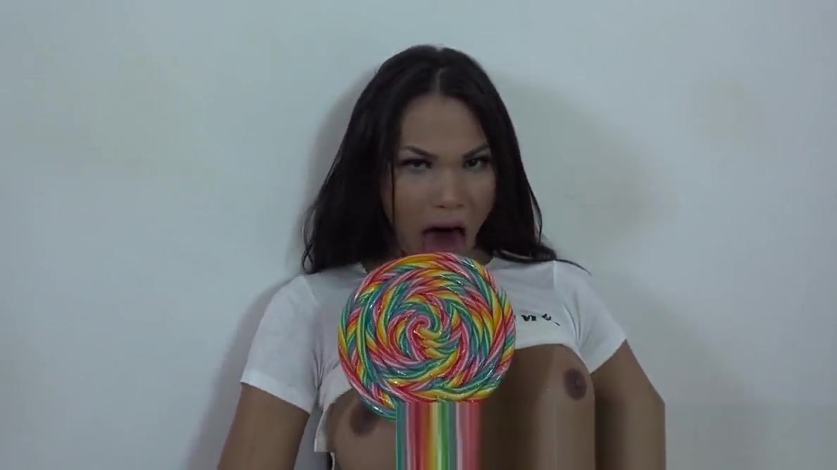 Bubble butt latina transsexual strips and strokes her cock