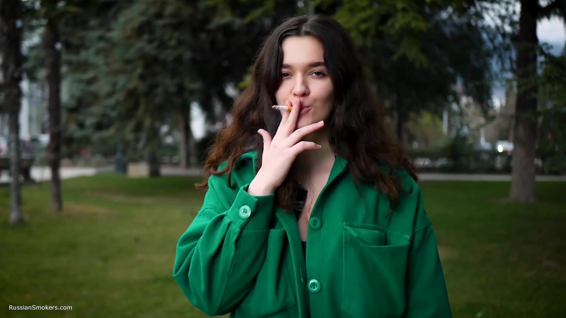 Beautiful Brunette Is Smoking Cork Strong Cigarettes