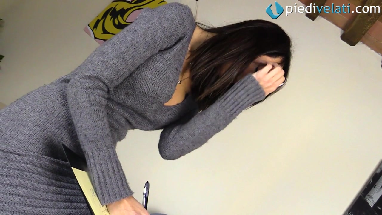 Flirtatious Daniela showing off her pantyhosed feet