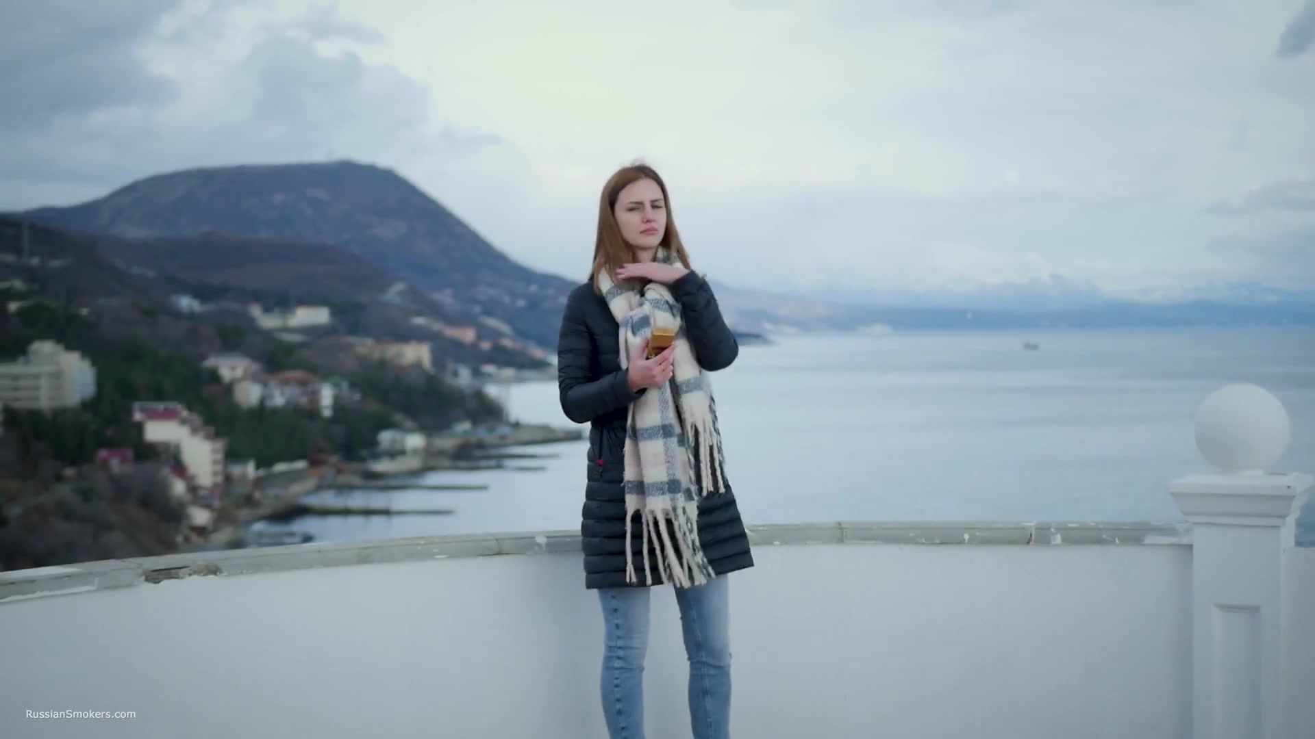 Beautiful Lady Is Smoking Two Saratoga Cigarettes In A Row On A Beautiful View