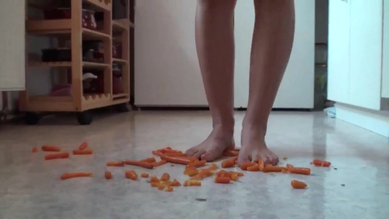 Close up of trampling food in the kitchen by Foot Girls