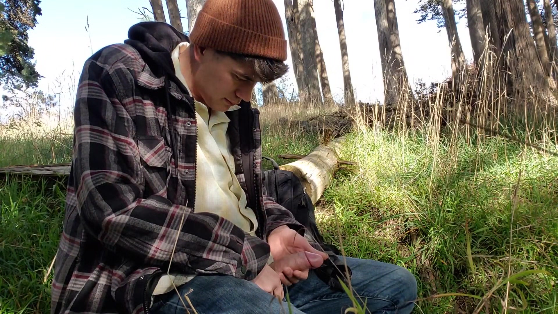 Boy stops jacking off to piss in the woods