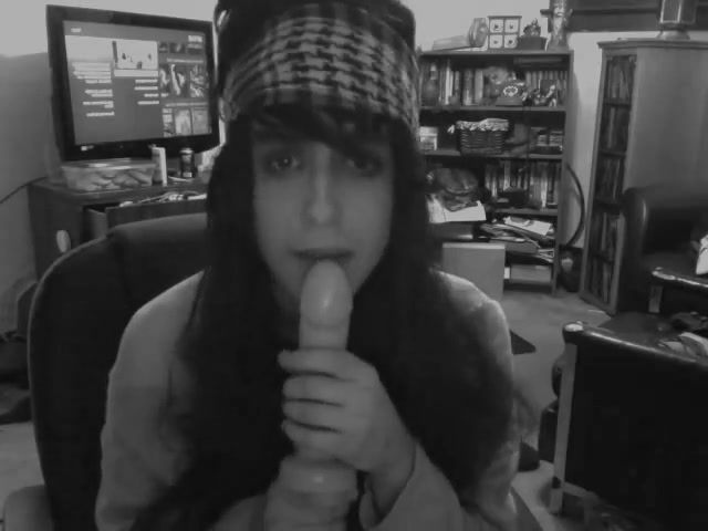 Crossdresser sucking dildo