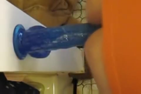 Chastity tranny fucks 9 inch wall dildo