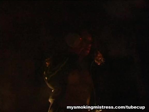 Smoking Mistress Sits on Slave