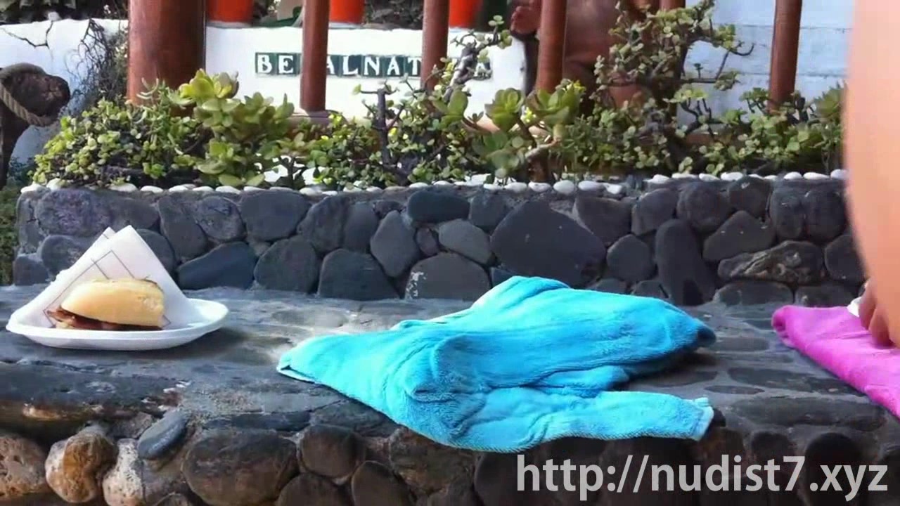 Spying on a cute cutie at the nudist beach cam