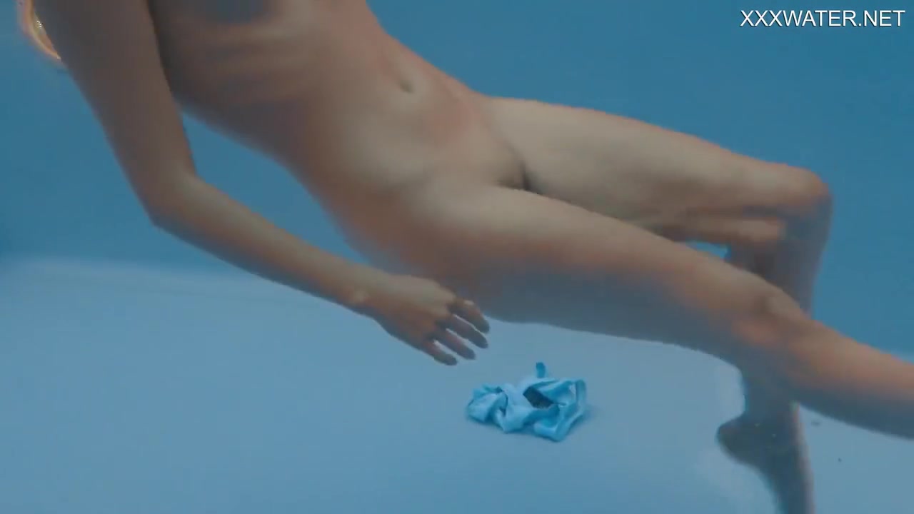 Petite Russian Marfa Swims Nude In The Pool