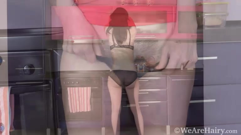Mimada strips naked on her kitchen rug - WeAreHairy