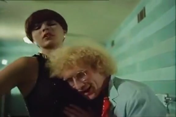 Desiree Cousteau in vintage sex movie with nasty sex in the toilet