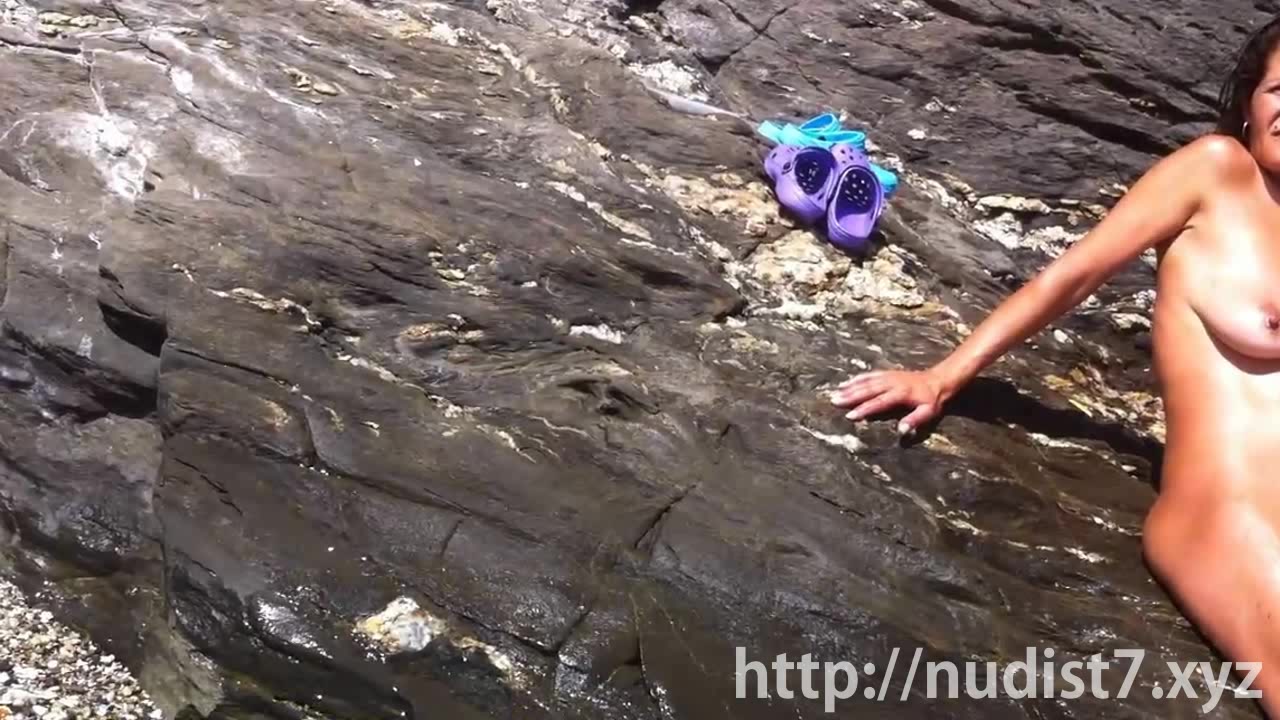 Spying on a cute cutie at the nudist beach cam