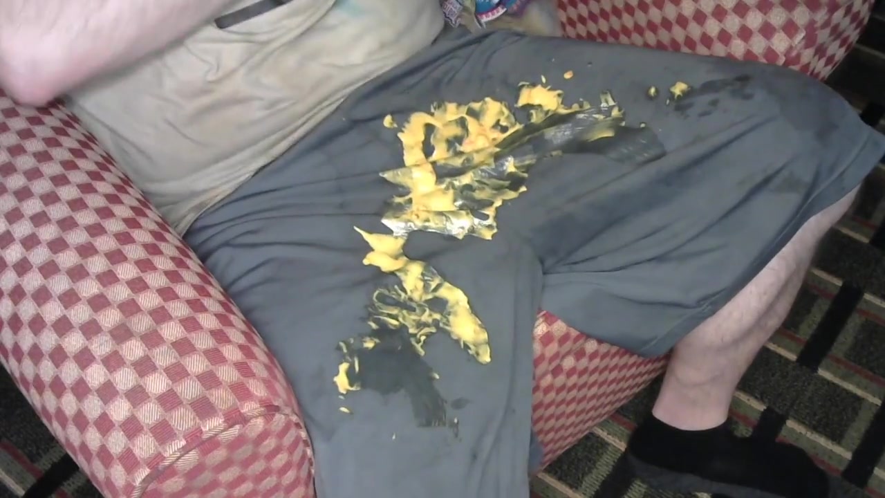 Having Some Hot Cheese Dip Using Nike Shorts For Bowl