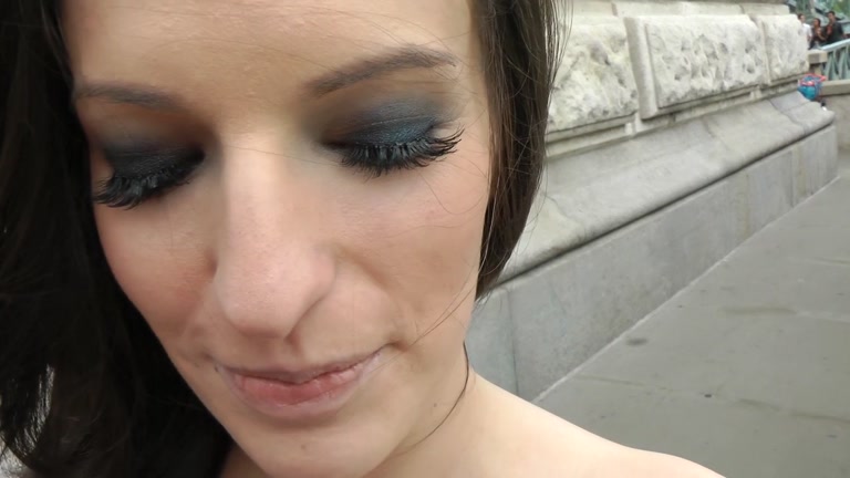 Young babe shows her tits in a public streets
