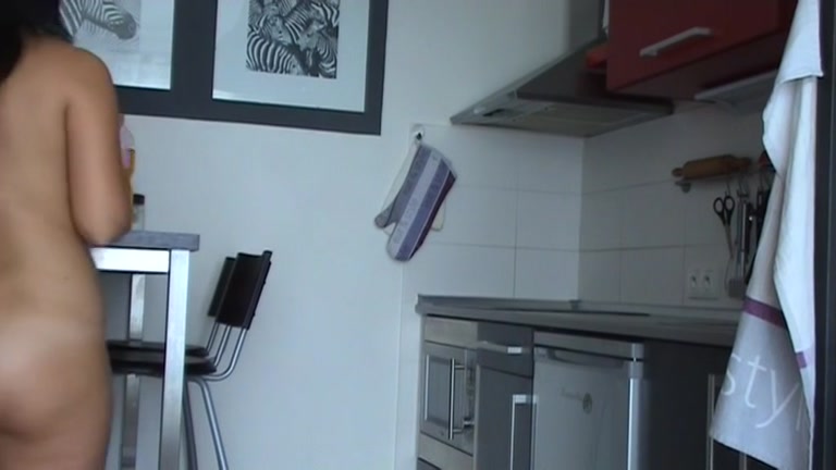 Exposed pair having sex in the kitchen and reaching agonorgasmos